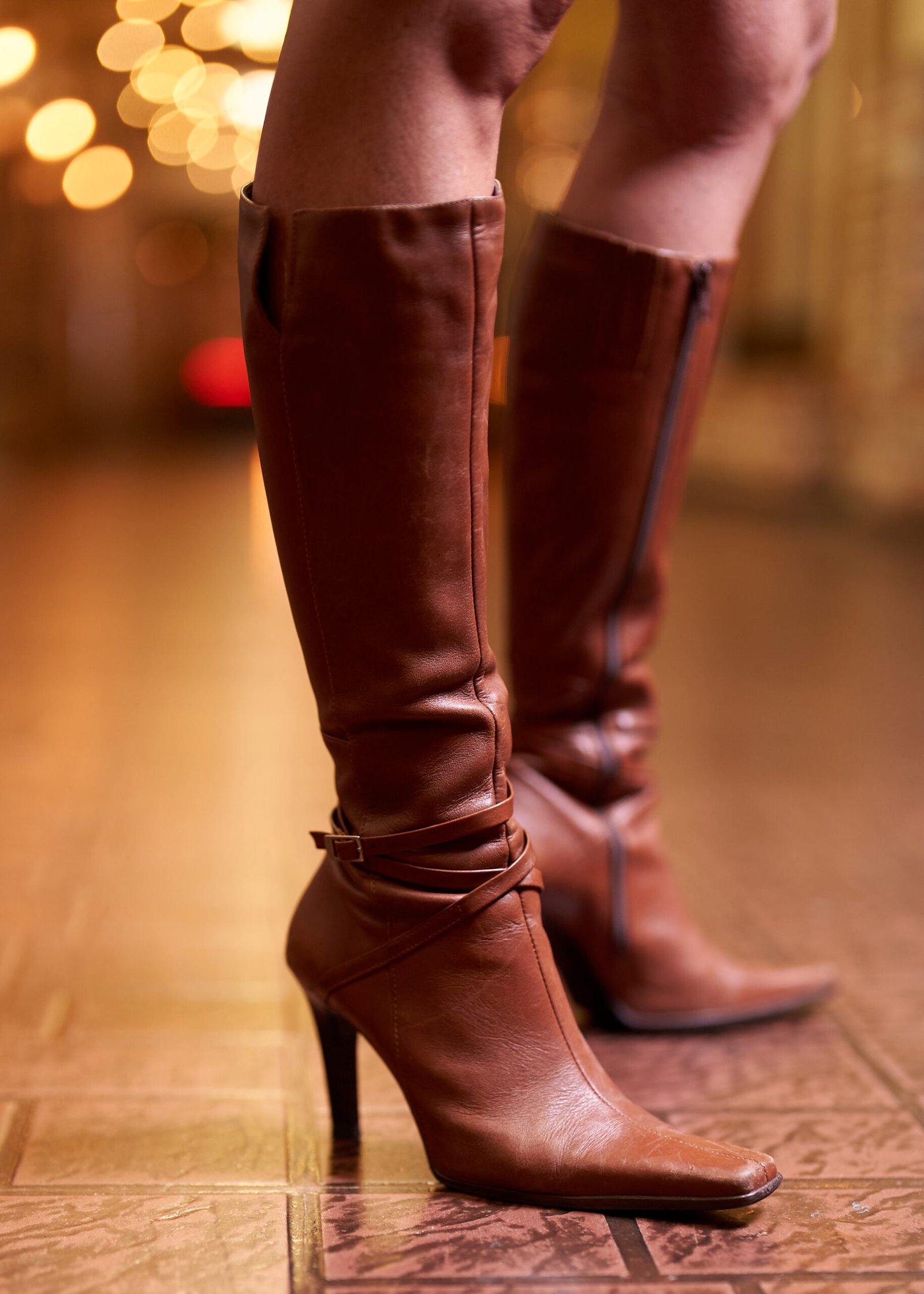 low-section-woman-standing-hardwood-floor